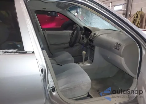 2000 Toyota Corolla Ce из США, поврежденный, VIN 1NXBR12E6YZ350455